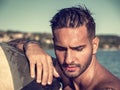 Young man standing in water in sea or lake Royalty Free Stock Photo