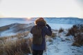 Young man standing in winter frozen nature. Ogoy island, lake Baikal, Siberia, Russia Royalty Free Stock Photo