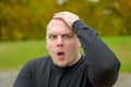 Young man staring at camera with aghast expression Royalty Free Stock Photo