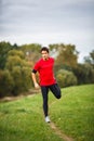 Young man stretching his legs Royalty Free Stock Photo