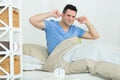 Young man struggling from noise in bed Royalty Free Stock Photo