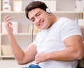 Young man student listening to music at home Royalty Free Stock Photo