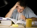 Young Man Studying at Night