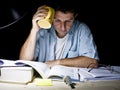 Young Man Studying at Night Royalty Free Stock Photo