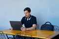 Young man studying remote work using laptop Royalty Free Stock Photo