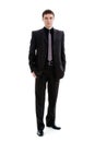 A young man in a suit, in full-length. Royalty Free Stock Photo