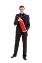 Young man in a suit holding a fire extinguisher. Royalty Free Stock Photo