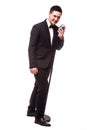 Young man in suit singing with the microphone. Royalty Free Stock Photo
