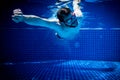 Young man with sunglasses enjoying the swimming pool Royalty Free Stock Photo