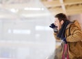 Young man supporting hockey game on skating rink Royalty Free Stock Photo