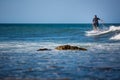 Young man surfing the waves Royalty Free Stock Photo