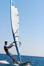 Young man surfing the wind Royalty Free Stock Photo