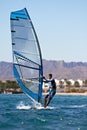 Young man surfing the wind Royalty Free Stock Photo