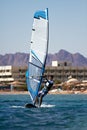 Young man surfing the wind Royalty Free Stock Photo