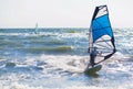 Young man surfing the wind Royalty Free Stock Photo