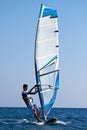 Young man surfing the wind Royalty Free Stock Photo