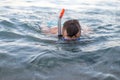 Young man swiming in a diving mask Royalty Free Stock Photo