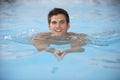 Young Man Swimming In Pool Royalty Free Stock Photo