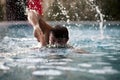 Young Man Swimming In Pool Royalty Free Stock Photo