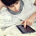 Young Man with Tablet Computer Royalty Free Stock Photo