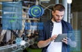 Young man with tablet pc and cows on dairy farm Royalty Free Stock Photo