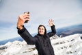 Young man take selfie in Winter in High Tatras Royalty Free Stock Photo