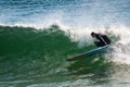 Young Man Takes on Ocean Breakers