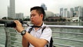 Young man taking photo of cityscape Royalty Free Stock Photo