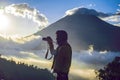 young man taking pictures looking in profile, Royalty Free Stock Photo