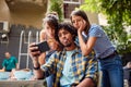 Young man taking a selfie with his friends Royalty Free Stock Photo