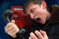 Young man talking on the phone with agression Royalty Free Stock Photo