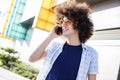 Young man talking phone in the city Royalty Free Stock Photo