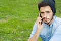 Young man talking on the phone Outdoors Royalty Free Stock Photo