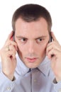 Young man talking on two phones