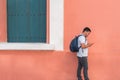 Young Man Talking On And Using His Cellphone Royalty Free Stock Photo