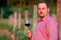 Young man is tasting red wine Royalty Free Stock Photo