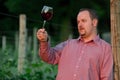 Young man is tasting red wine Royalty Free Stock Photo