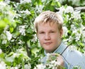 Young man,teenager standing near the apple Royalty Free Stock Photo