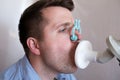Young man testing breathing function by spirometry Royalty Free Stock Photo