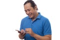 Young Man Texting Reading Chatting on His Phone, Smiling Happy Royalty Free Stock Photo