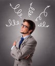 Young man thinking with arrows overhead