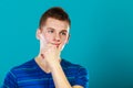 Young man thinking, thoughtful face expression Royalty Free Stock Photo