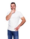 Young man thinking in a white polo shirt Royalty Free Stock Photo