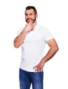 Young man thinking in a white polo shirt Royalty Free Stock Photo