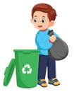 a young man throws rubbish in garbage bin