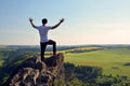 Young man on top of rock Royalty Free Stock Photo