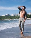 Young man topless outdoor portrait hiking near the sea Royalty Free Stock Photo