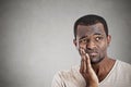 Young man touching face having really bad pain tooth ache Royalty Free Stock Photo