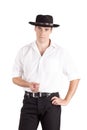 Young man touching his hat Royalty Free Stock Photo