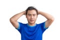 Young man touching his head and keeping eyes closed isolated on white background, suffering from severe headache or migraine pain Royalty Free Stock Photo